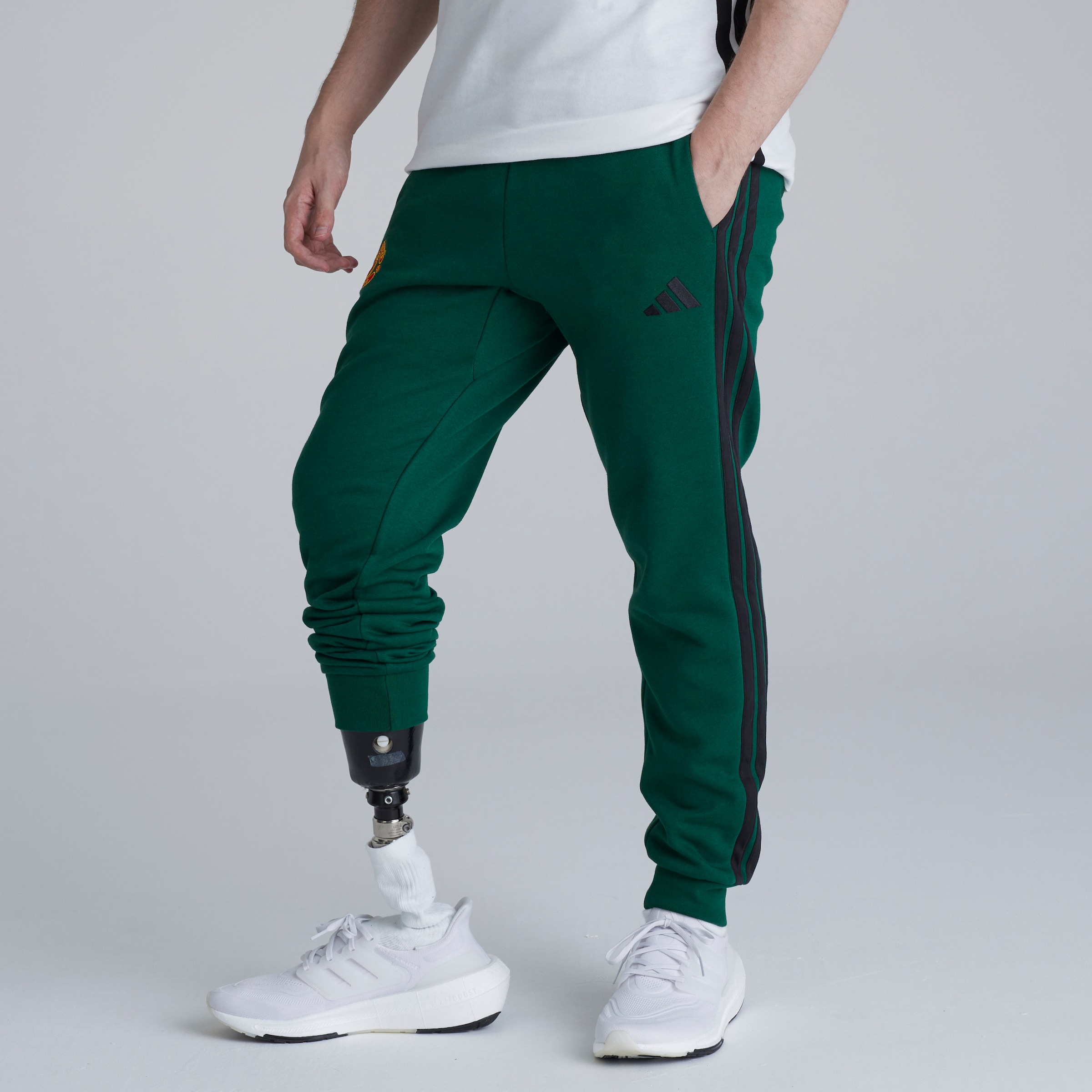 Manchester United x adidas Essentials 3-Stripes Fleece Joggers Green
