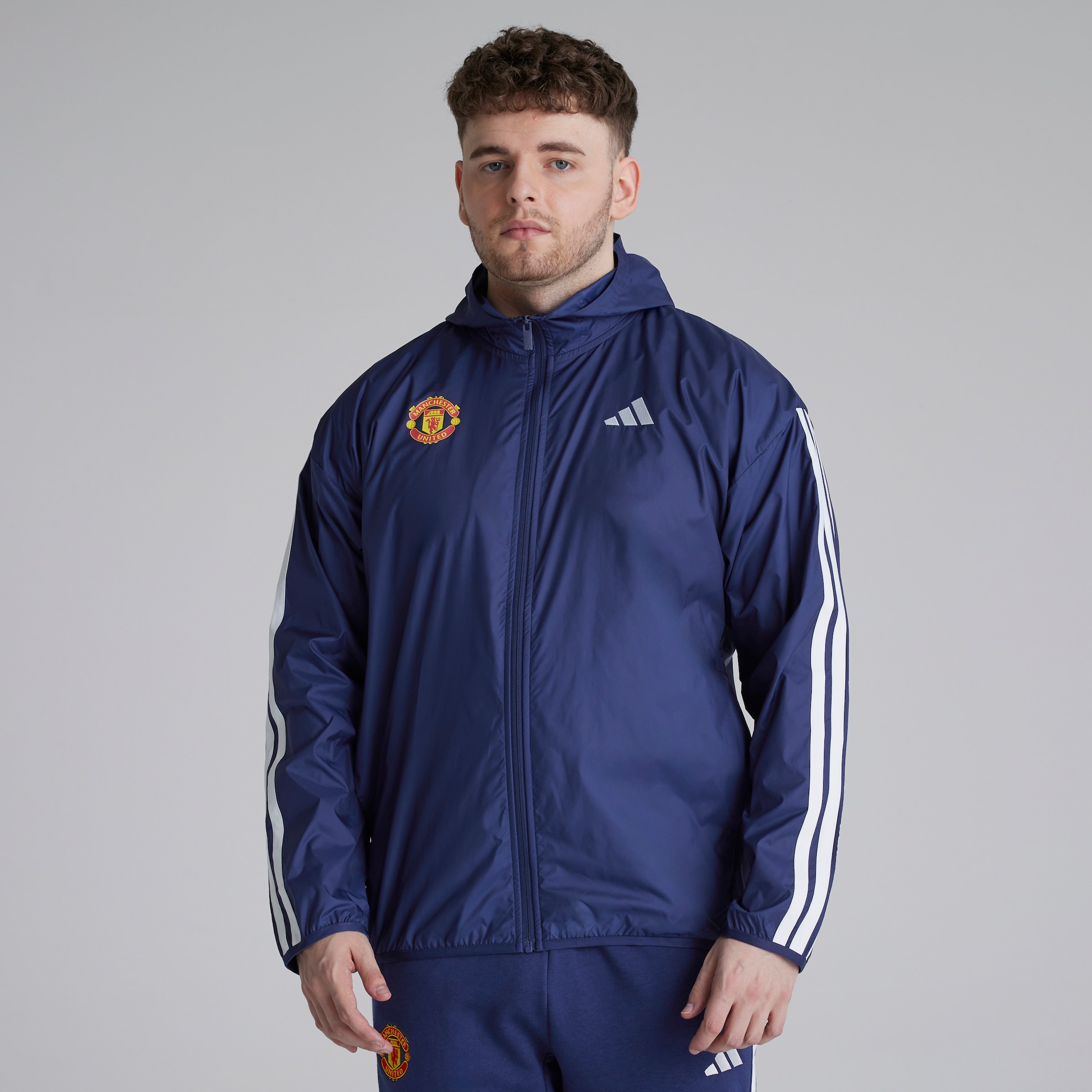 Manchester United x adidas Essentials 3-Stripes Windbreaker Blue
