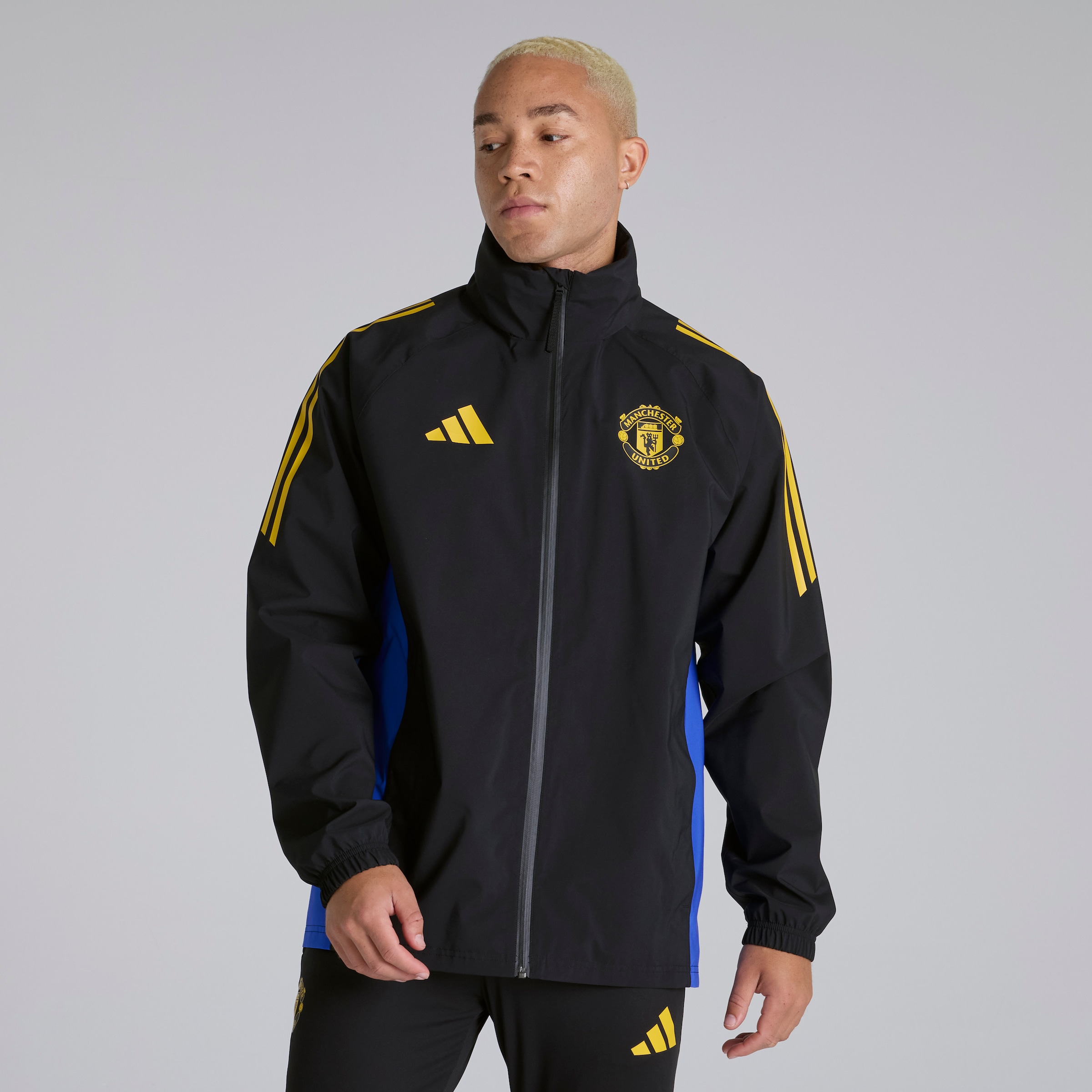 Manchester United Tiro 25 Competition Rain Jacket Black